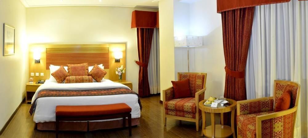 Park Lane Hotel لاهور المظهر الخارجي الصورة A room at the hotel