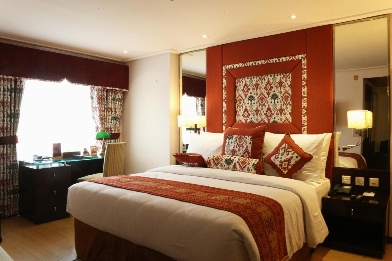 Park Lane Hotel لاهور المظهر الخارجي الصورة A bedroom at the hotel