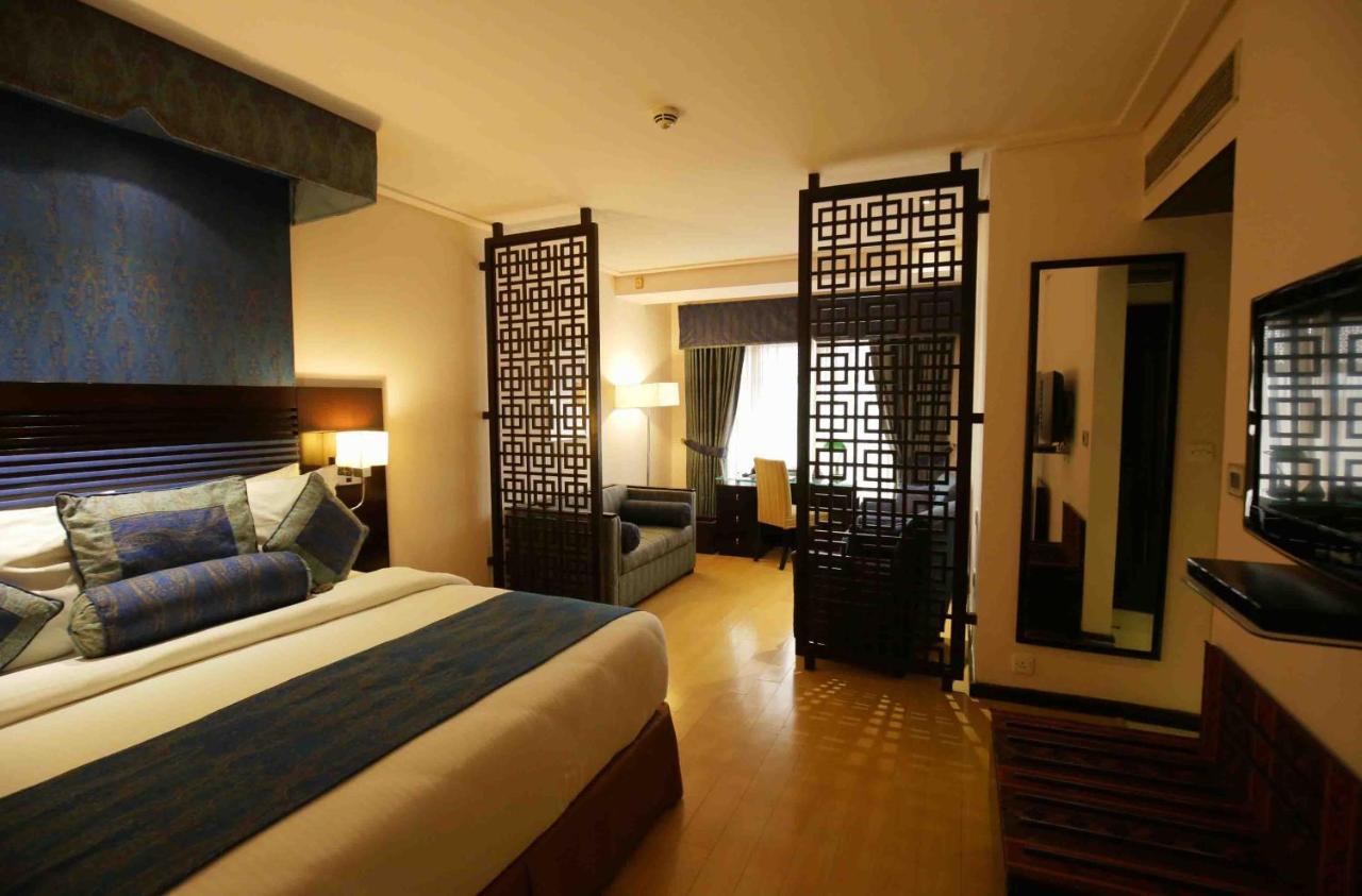 Park Lane Hotel لاهور المظهر الخارجي الصورة A room at the hotel