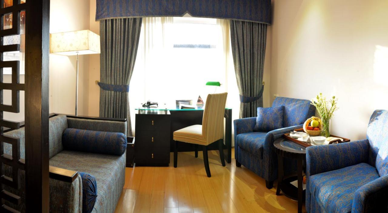 Park Lane Hotel لاهور المظهر الخارجي الصورة A suite at the hotel